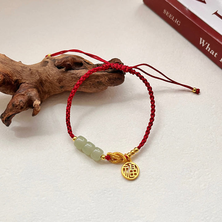 Buddha Stones Handgefertigtes Jade-Perlen-Fu-Charakter-Charm-Glücksarmband mit rotem Seil