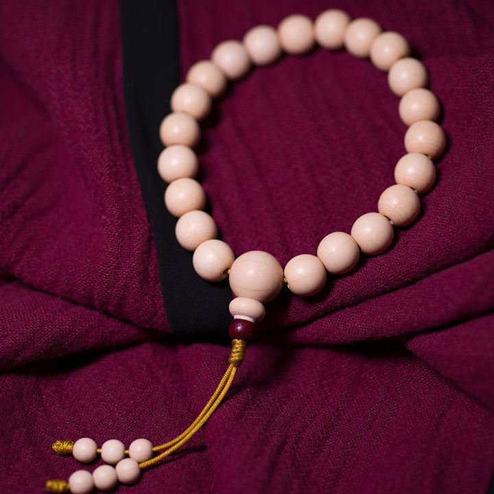 Buddha Stones Segens-Handgelenk-Mala aus natürlichem Abelia Biflora-Holz