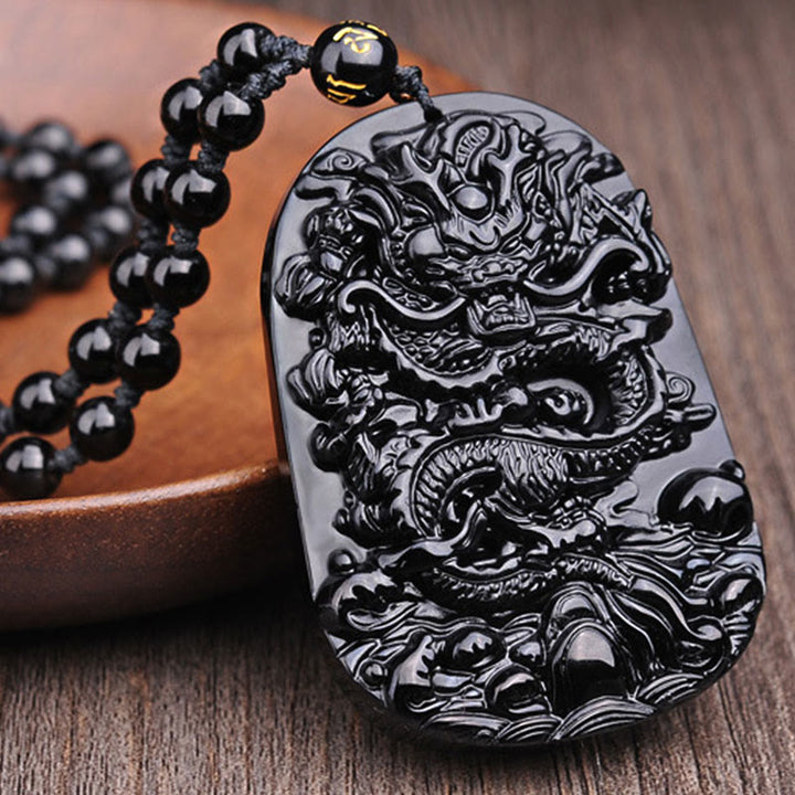 Halskette mit Anhänger „Drachenerfüllung“ aus schwarzem Obsidianstein von Buddha Stones