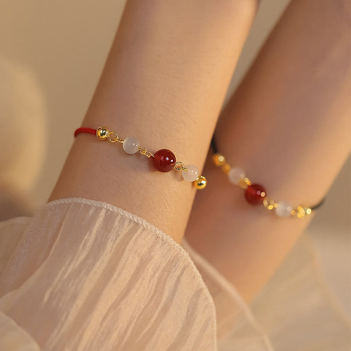 Buddha Stones Rotes Achat-Katzenaugen-Armband mit geflochtener Schnur