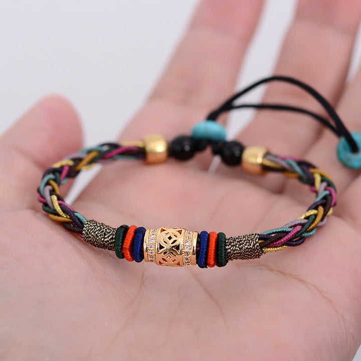 Buddha Stones, tibetisches handgefertigtes Acht-Faden-Knoten-Kupfer-Münzen-Glücks-Gewebe-Schnur-Armband