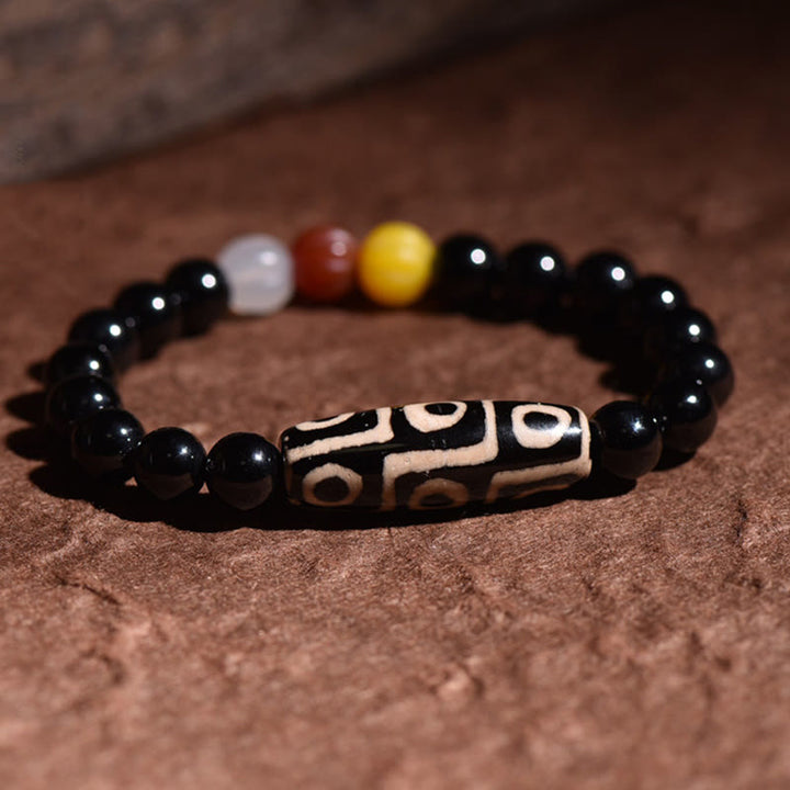 Buddha Stones Tibetisches natürliches Neun-Augen-Dzi-Perlen-Reichtum-Kraft-Armband