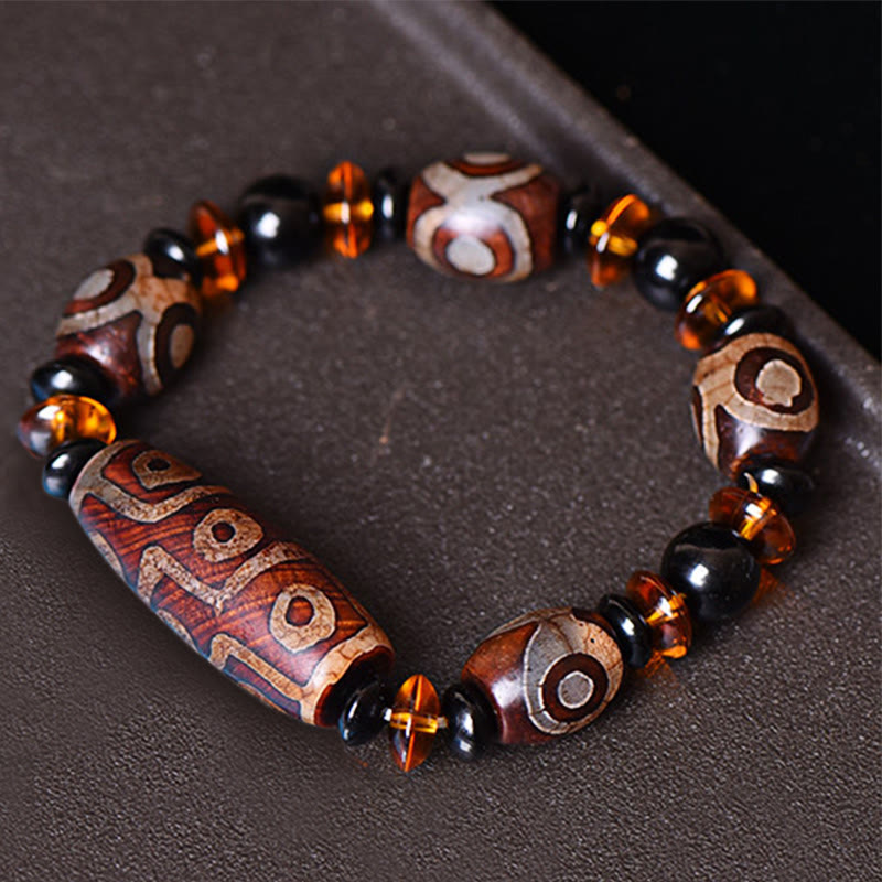 Buddha Stones Tibetisches Retro Natürliches Neun-Augen-Dzi-Perlen-Segens-Armband