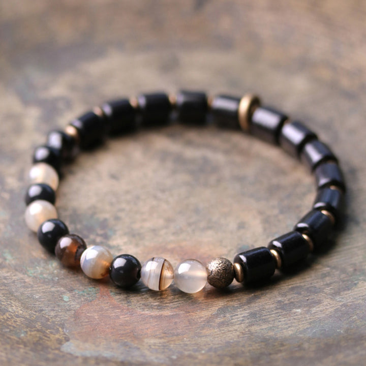 Armband mit Buddha Stonesn, Ebenholz, rotem Jaspis, Moos-Achat, Kristall, Kupfer, Friedenspaar