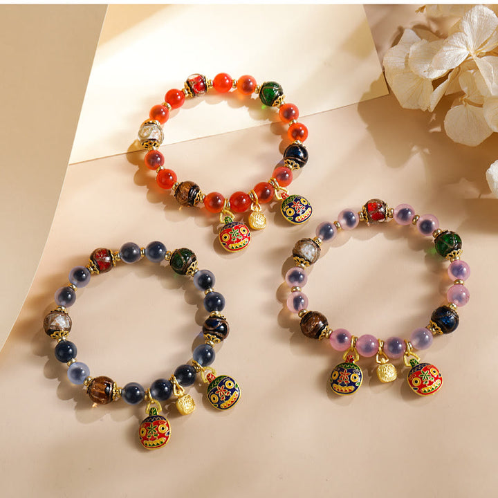 Buddha Stones, buntes Bonbon-Achat-Gold, schluckendes Biest, Familie Liuli, Glasperlen, Stärke-Armband