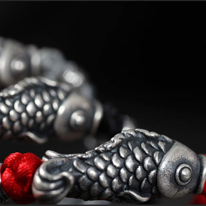 Buddha Stones Silberfarbenes geflochtenes Koi-Fisch-Glücksarmband