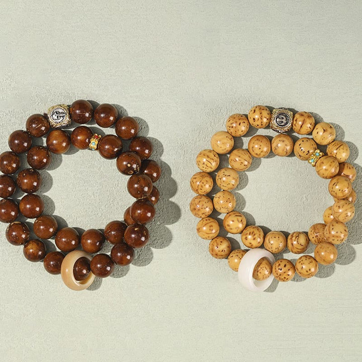 Buddha Stones, tibetisches Natur-Lila-Gold-Ratten-Bodhi-Samen-Reichtum, doppelt gewickeltes Armband