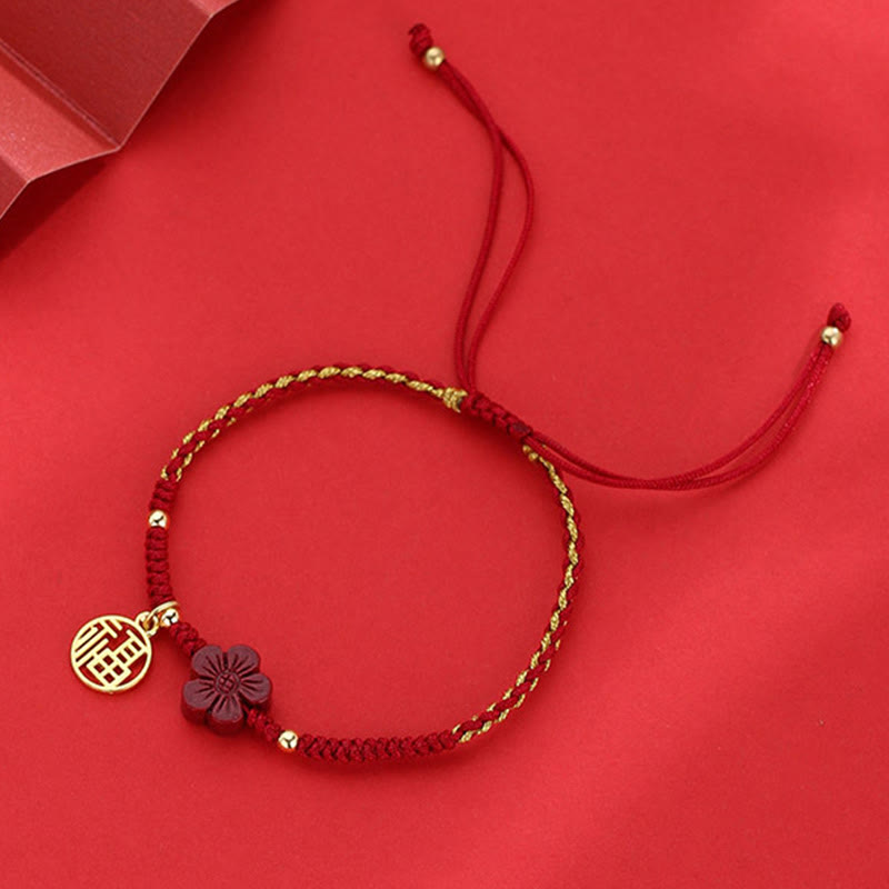 Buddha Stones Cinnabar Flower Fu Charakter Segen geflochtenes Schnurarmband