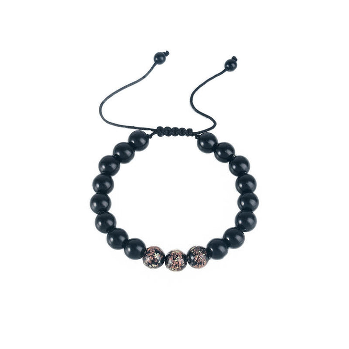 Buddha Stones Armband mit leuchtendem Glühstein und schwarzem Obsidian