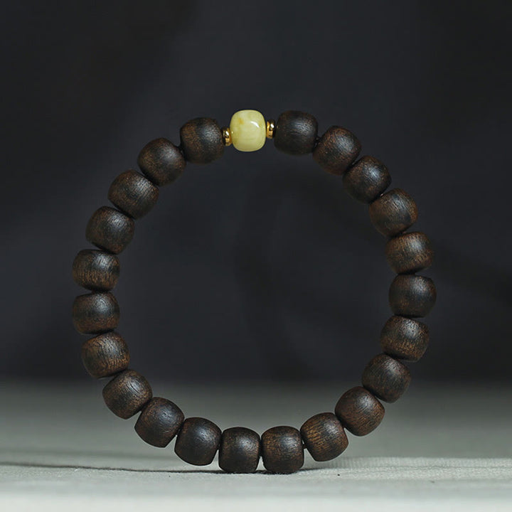 Buddha Stones Seltenes Brunei-Adlerholz-Bernstein-Balance-Peace-Calm-Armband