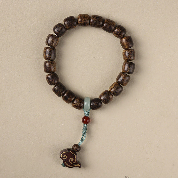 Armband mit Buddha Stonesn, Agarholz, Kupfermünze, verheißungsvolle Wolke, Ruhe