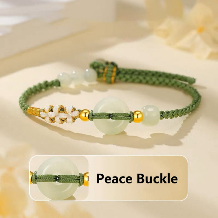 Buddha Stones Hetian Jade Friedensschnalle Glück Pfirsichblüte geflochtenes Armband
