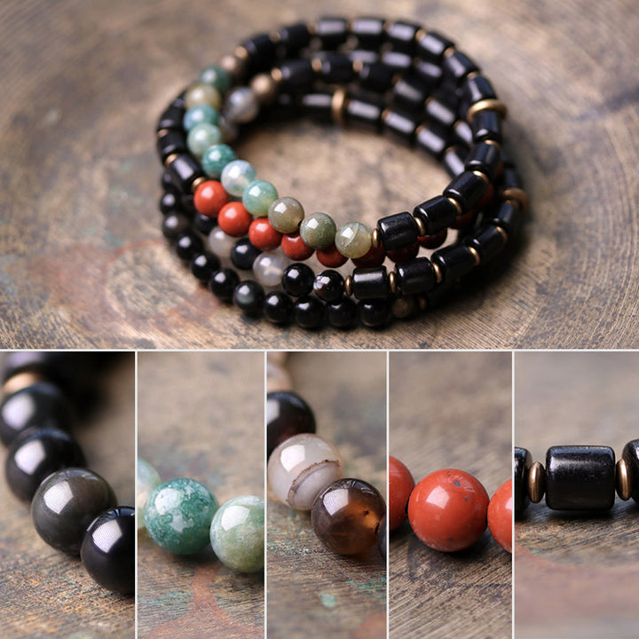 Armband mit Buddha Stonesn, Ebenholz, rotem Jaspis, Moos-Achat, Kristall, Kupfer, Friedenspaar