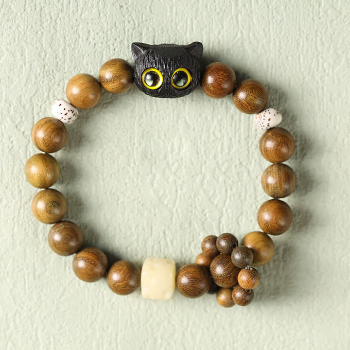 Buddha Stones Grünes Sandelholz Ebenholz Holz Katze Frieden beruhigendes Armband