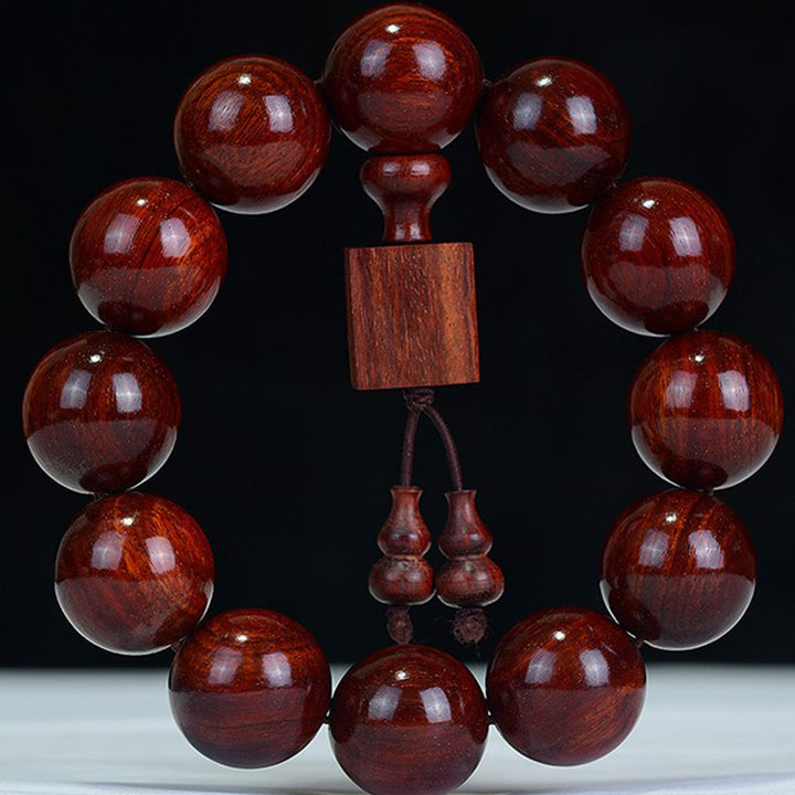Buddha Stones Tibetisches kleines Blatt-Entspannungsarmband aus rotem Sandelholz