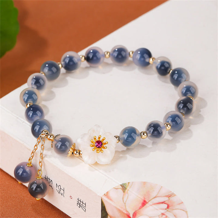 Buddha Stones natürliches blaues Bonbon-Achat-Kirschblüten-Armband mit heilender Stärke