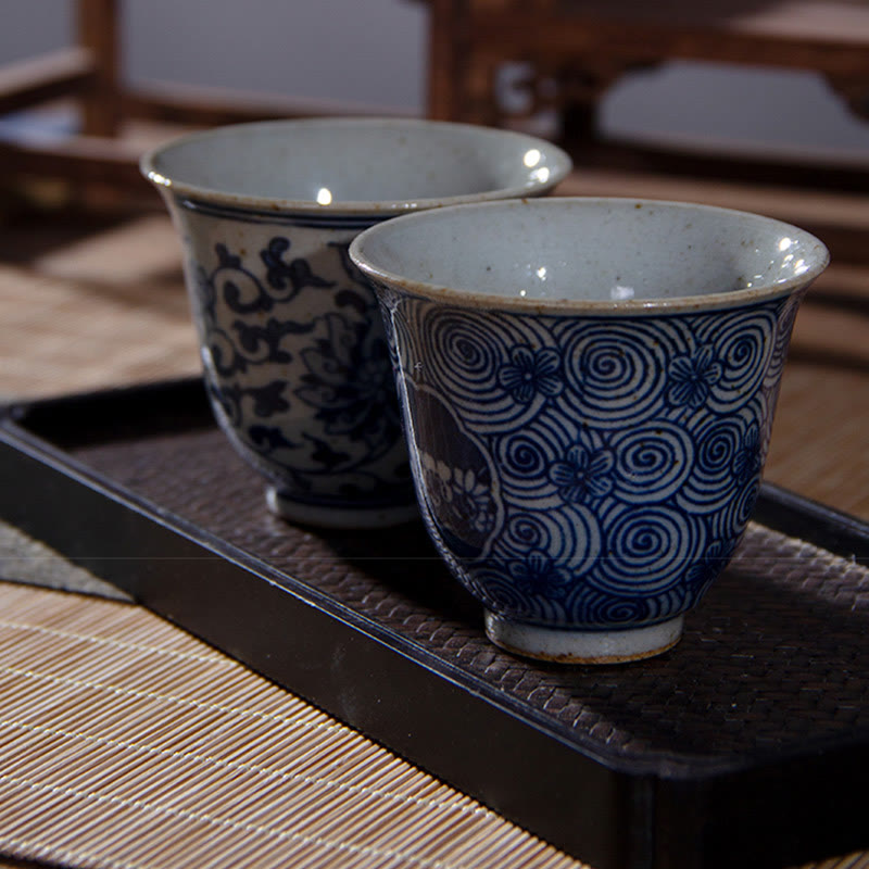 Buddha Stones Jingdezhen Blaues und Weiß Porzellan, handbemalte Lotus-Pflaumenblüten-Keramik-Teetasse, Kung-Fu-Teetassen