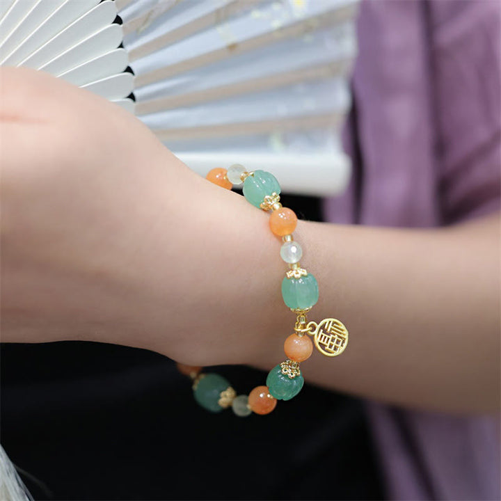 Buddha Stones natürliche goldene Seide Jade Kürbis Perle Fu Charakter Charme Reichtum Armband