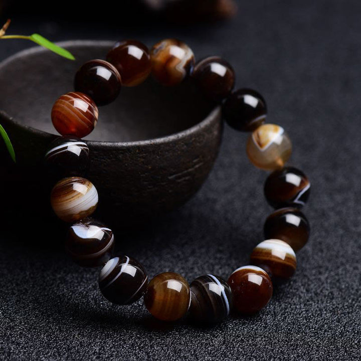 Tibetisches Sardonyx-Happiness-Positive-Armband mit Buddha Stonesn