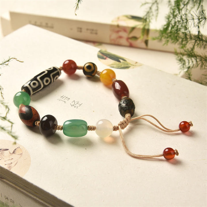 Buddha Stones Tibetisches Neun-Augen-Dzi-Perlen-Achat-Wohlstandsschutz-Armband