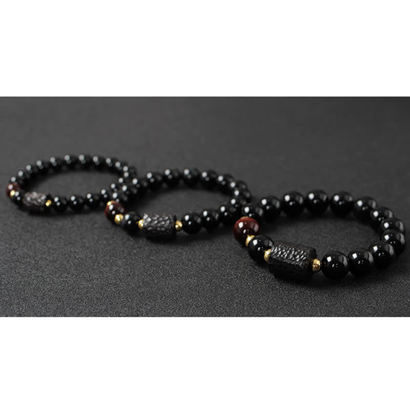 Schwarzes Obsidian-Ebenholz-Holz, rotes Tigerauge, Stärke-Paar-Armband