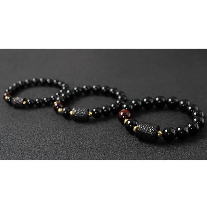 Schwarzes Obsidian-Ebenholz-Holz, rotes Tigerauge, Stärke-Paar-Armband