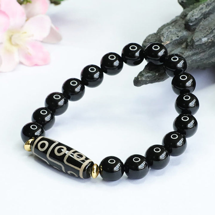 Buddha Stones Tibetisches Neun-Augen-Dzi-Perlen-Armband aus schwarzem Onyx