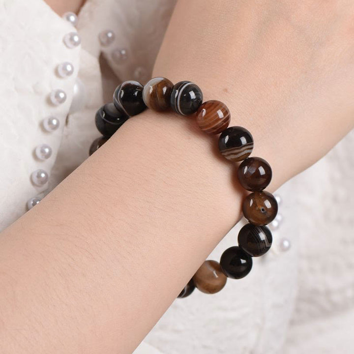 Tibetisches Sardonyx-Happiness-Positive-Armband mit Buddha Stonesn