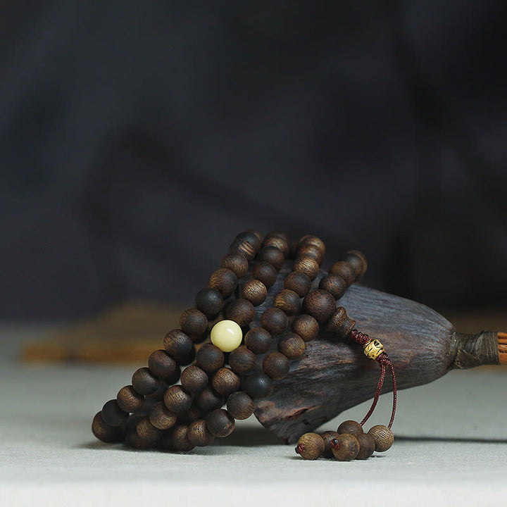 Buddha Stones 999 Gold Tarakan 108 Mala Perlen Adlerholz Bernstein Armband zur Abwehr böser Geister