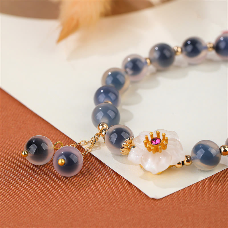 Buddha Stones natürliches blaues Bonbon-Achat-Kirschblüten-Armband mit heilender Stärke