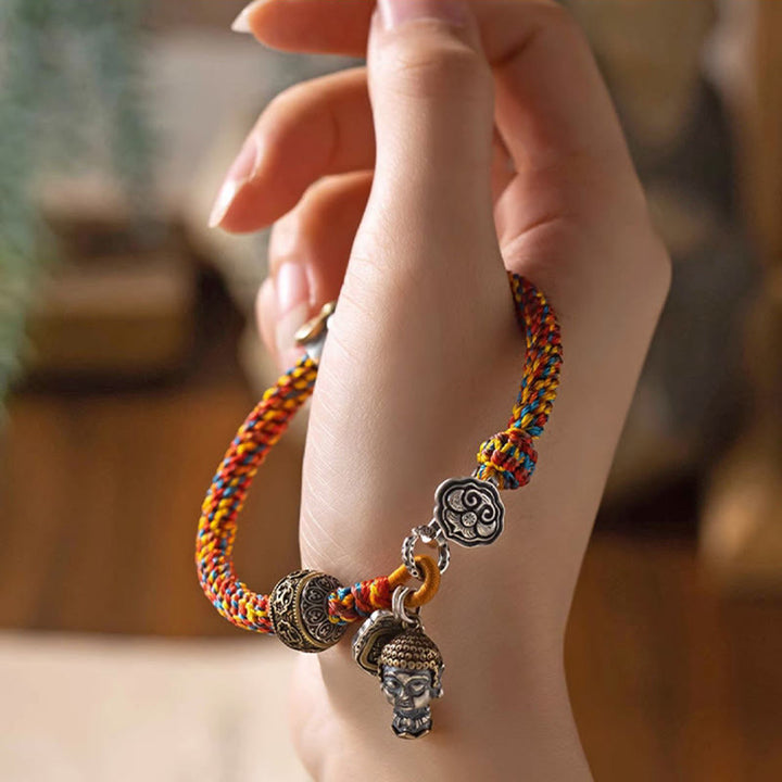 Buddha Stones Handgefertigtes tibetisches Armband aus 925er Sterlingsilber mit chinesischem Sternzeichen Natal Buddha Zakiram, Göttin des Reichtums, Schutz, mehrfarbiges, geflochtenes Seil