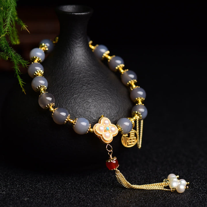 Buddha Stones natürliches graues Achat-Fu-Charakter-Perlen-Quasten-Balance-Armband