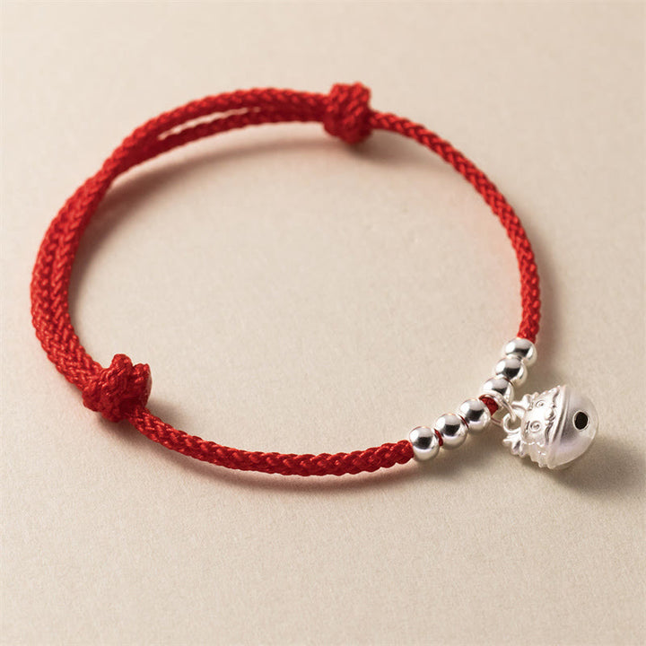 Buddha Stones Jahr des Drachen 925 Sterling Silber handgefertigtes, in Drachenform geschnitztes, geflochtenes rotes Armband
