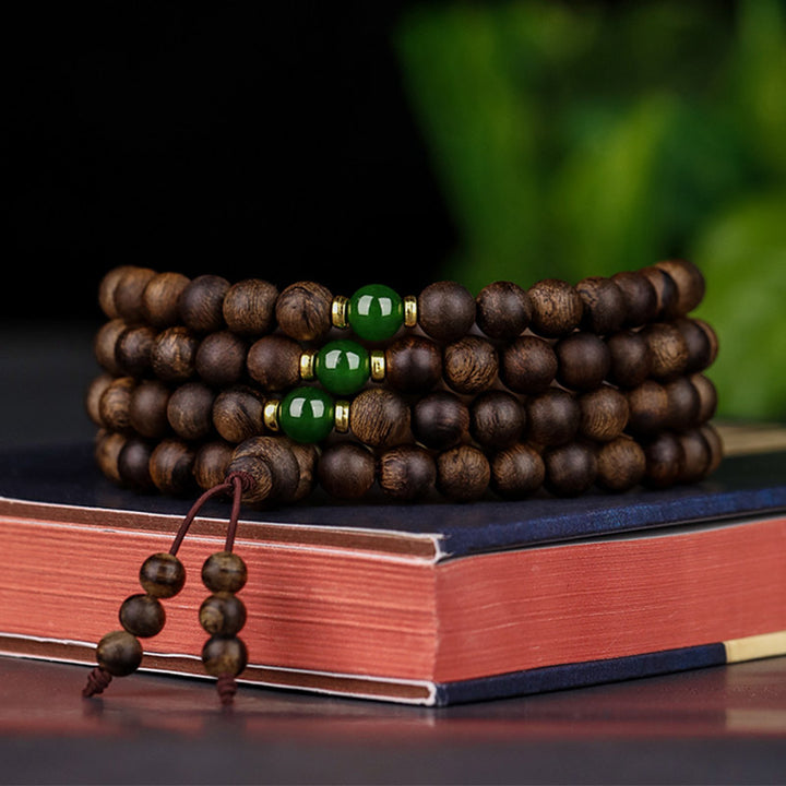 Buddha Stones 108 Mala Perlen Indonesien Tarakan Seltenes Adlerholz Cyan Jade Armband zur Abwehr böser Geister