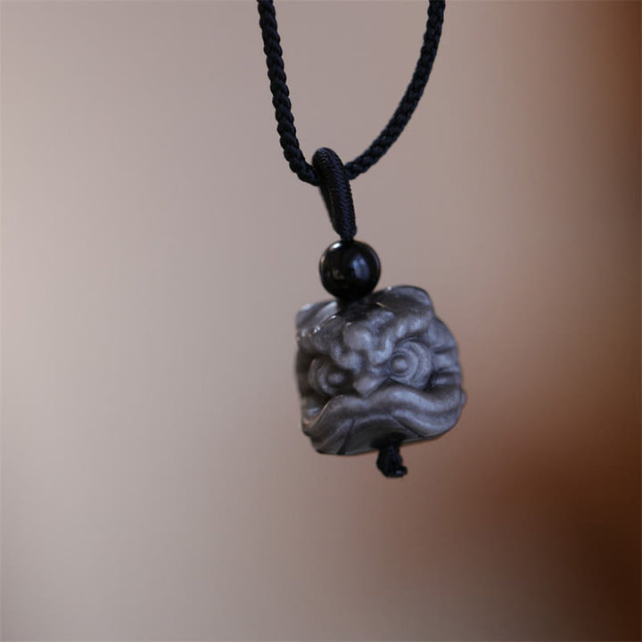 Buddha Stones Natürlicher Obsidian-Halskettenanhänger mit tanzendem Löwenschutz und silbernem Glanz