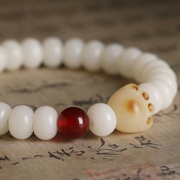 Buddha Stones Natürliches Bodhi-Samen-Armband mit schöner Pfote und glücklicher Katze