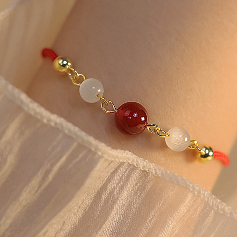 Buddha Stones Rotes Achat-Katzenaugen-Armband mit geflochtener Schnur