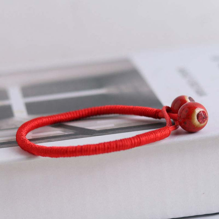 Buddha Stones FengShui Lucky Red String Keramikarmband