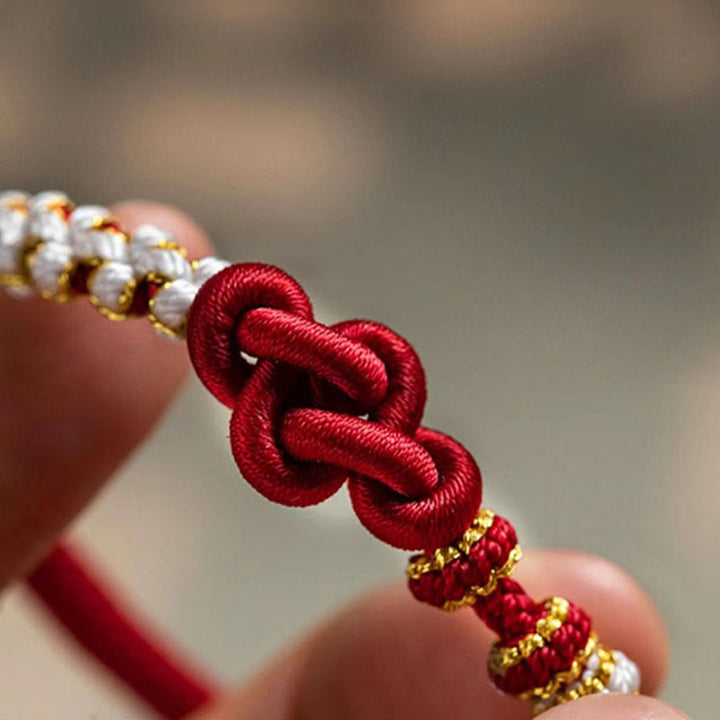 Buddha Stones Handgefertigtes Armband mit Knoten-Pfirsichblüten-Charm und Glücksseil