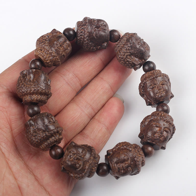 Buddha Stones Agarwood Buddha geschnitztes ruhiges Armband