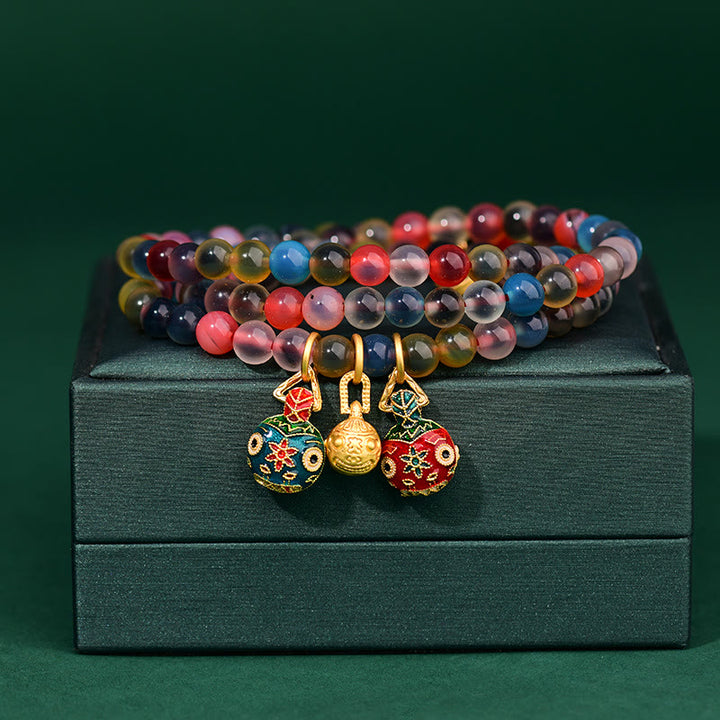 Dreifach gewickeltes Armband mit Buddha Stonesn, buntem Bonbon-Achat und Gold, schluckendes Tier, Familienstärke, Charm