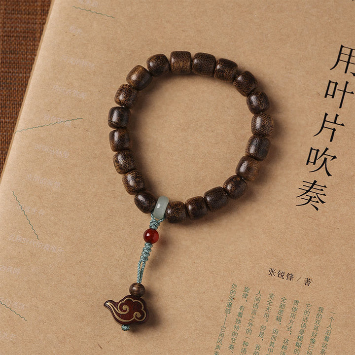 Armband mit Buddha Stonesn, Agarholz, Kupfermünze, verheißungsvolle Wolke, Ruhe