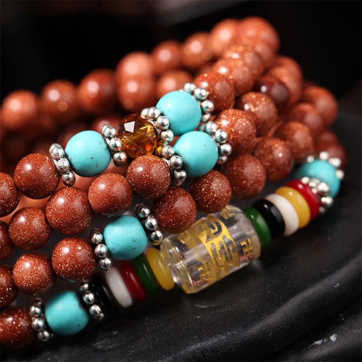 Buddha Stones 108 Mala Perlen Goldstone Om Mani Padme Hum Swastika Confidence Armband