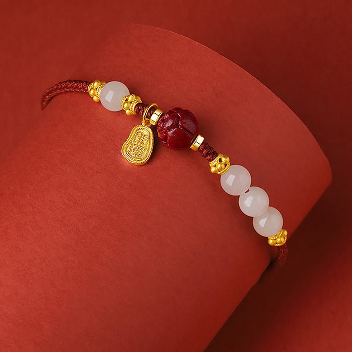 Buddha Stones 24K vergoldetes Hetian Weiß Jade Cinnabar Lotus Glücksseil-Armband