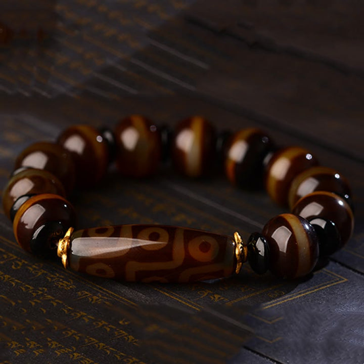 Buddha Stones Tibetisches natürliches Neun-Augen-Dzi-Perlen-Achat-Armband für Reichtum und Segen