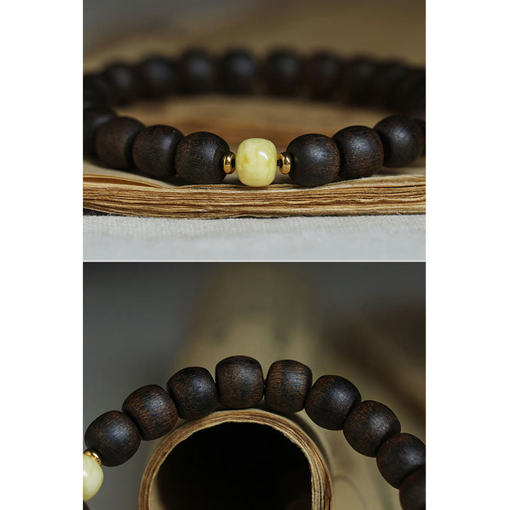 Buddha Stones Seltenes Brunei-Adlerholz-Bernstein-Balance-Peace-Calm-Armband