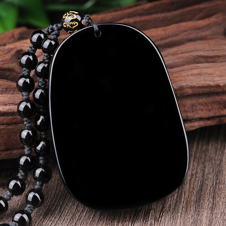 Halskette mit Anhänger „Drachenerfüllung“ aus schwarzem Obsidianstein von Buddha Stones