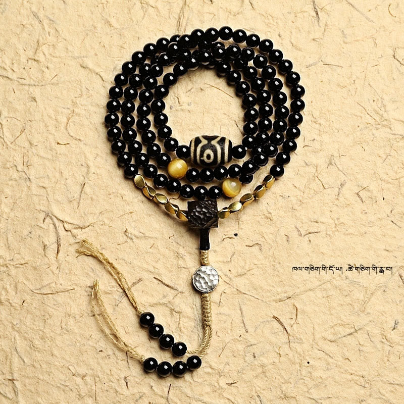 Tibetisches Schutzarmband mit 108 Mala-Perlen, schwarzem Onyx, dreiäugigen Dzi-Perlen