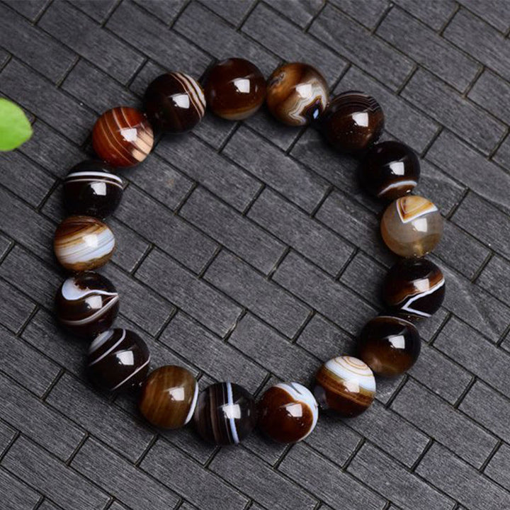 Tibetisches Sardonyx-Happiness-Positive-Armband mit Buddha Stonesn