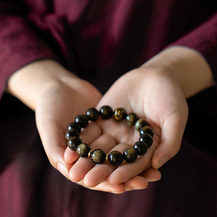 Chinesisches Tierkreis-Natal-Buddha-Goldglanz-Obsidian-Armband zum Schutz des Reichtums